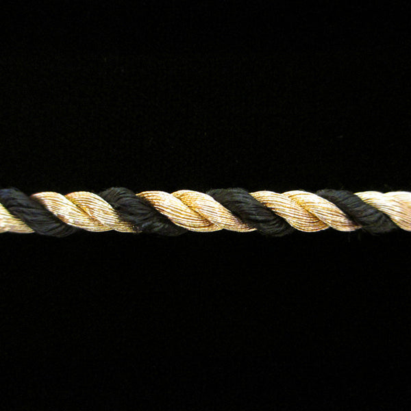 303.1 Metallic cord gold/black 3/16" (5mm) - Palladia Passementerie
 - 1